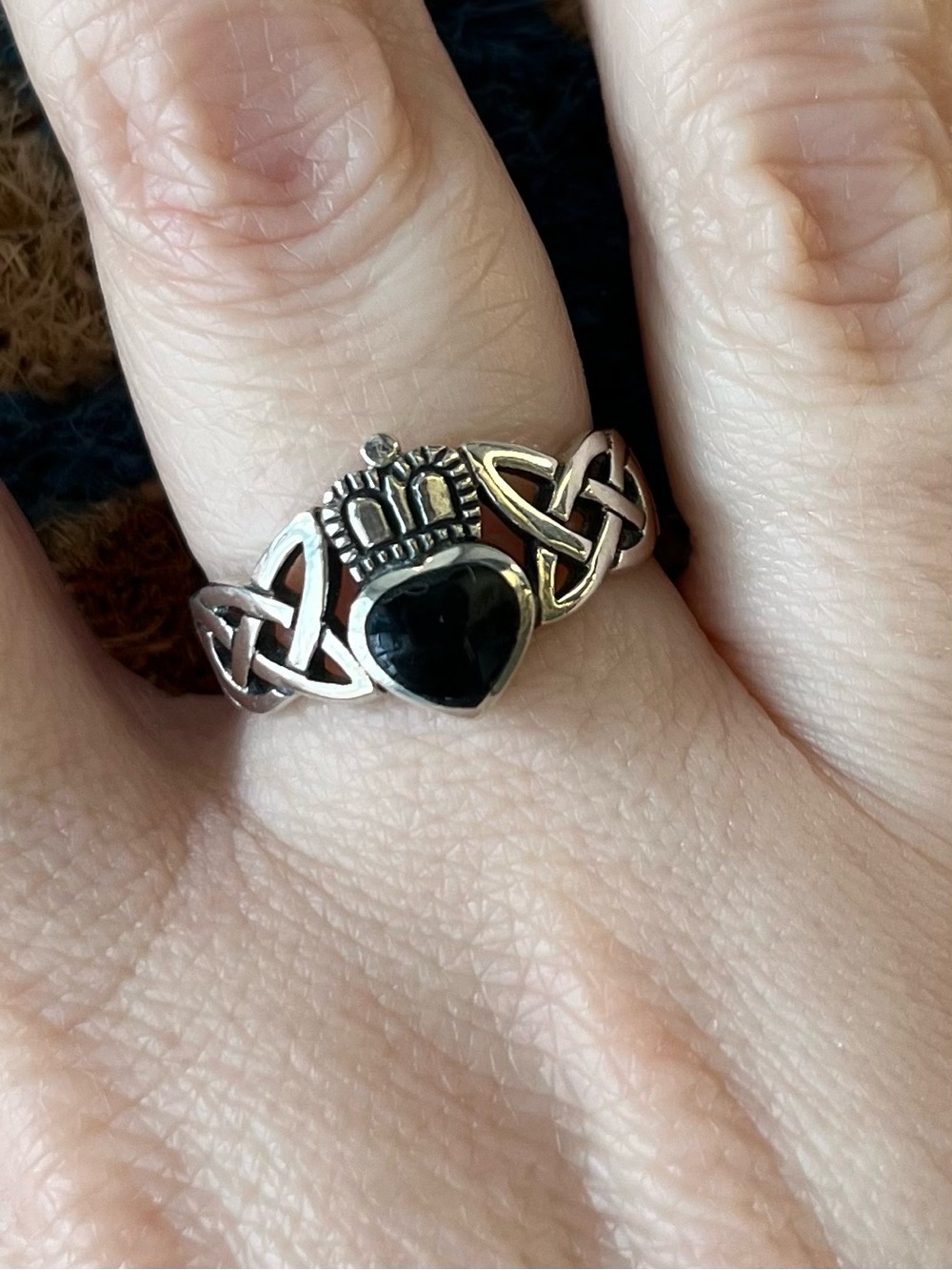 Sterling silver Irish Claddagh ring with celtic knots & black onyx stone heart.